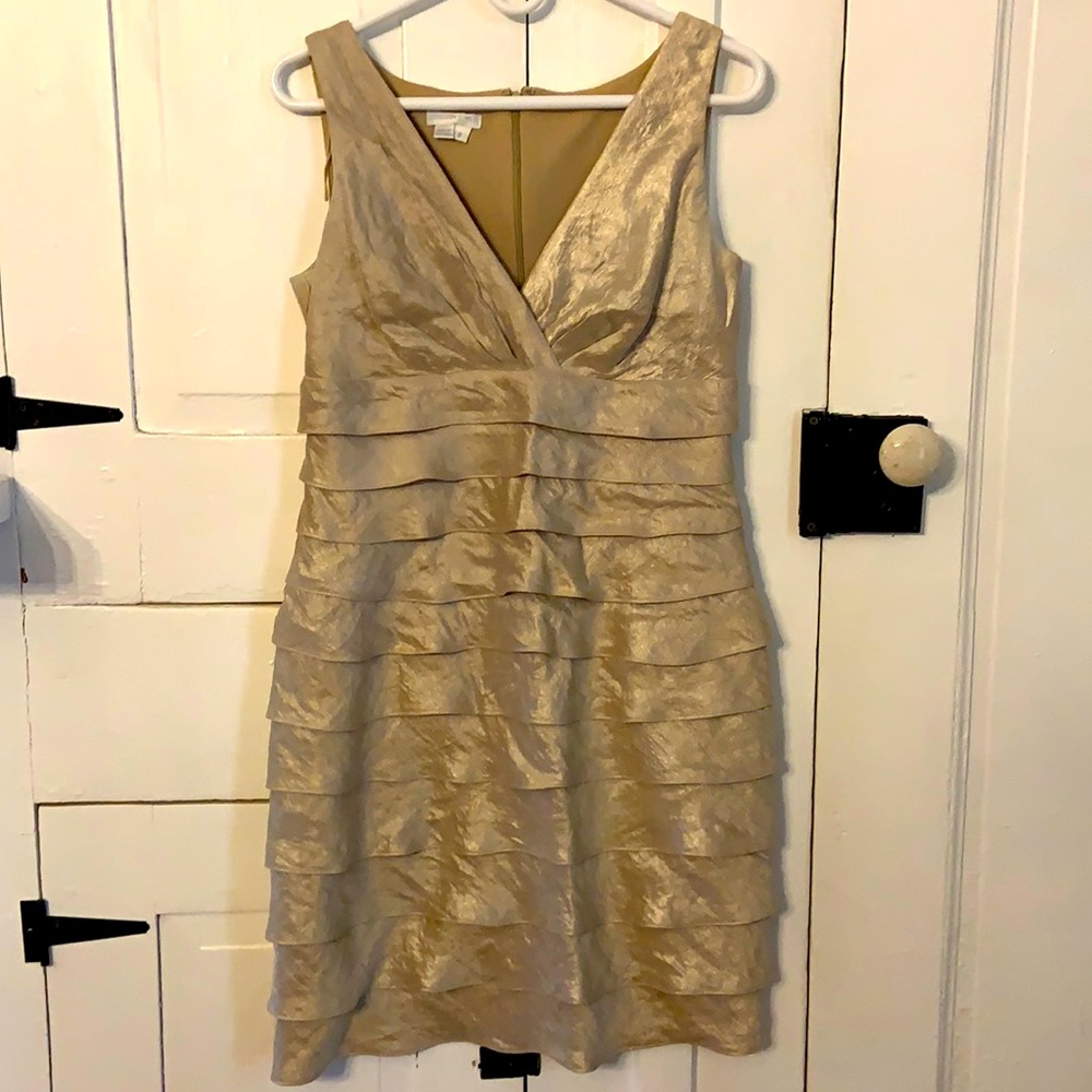 Women’s semi-formal dress. Shimmery gold color. Great condition.